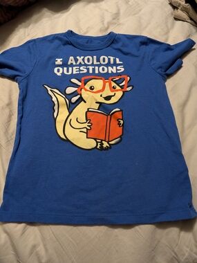 Place Blue Graphic Tee with Yellow Axolotl and Orange Book
